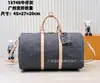 Transmisión en Vivo Transfronteriza de Productos de Alta Calidad Moda Europea y Americana Marca L Bolsa de Equipaje de Gran Capacidad de Mezclilla Bolso Cruzado de Viaje