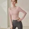 Roupa de Yoga com Sensação de Segunda Pele para Mulheres Outono e Inverno 2026 Camiseta de Manga Longa para Esportes, Corrida, Pilates, Fitness com Bojos Fixos