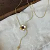 Collar de Piedra Ojo de Tigre Melard: Una pieza lujosa y sofisticada, perfecta para usar en capas con suéteres en otoño e invierno. Un accesorio versátil y moderno, disponible para venta al por mayor
