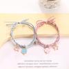 Pulsera pequeña de dibujos animados para pareja femenina. Un par de pequeñas bandas de goma para novio. Pulsera con campana que atrae el imán. Regalo para mujer.