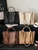 Bolso Tote de Gran Capacidad con Textura Tejida 2026 Nuevo Lanzamiento de Verano Bolso de Hombro Único Cruzado de Nicho Bolso Cubo para el Trabajo y el Viaje