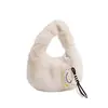 Bolsa de Mão de Design de Nicho Coreano Feminina 2025 Outono Versátil Pelúcia High-End Casual Carregamento de Mão Bolsa Dumpling