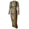 Transfronterizo 2024 transfronterizo otoño e invierno nueva ropa de mujer Amazon moda europea y americana estampado de leopardo manga larga sexy ajustada incluso