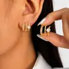 Pendientes de Cobre con Circonita Incrustada de Venta Caliente en Amazon para Mujer Modernos Exquisitos Tachuelas de Diamante Incrustado Curvas de Tres Garras En Stock Al Por Mayor