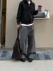 Pantalones casuales de cuadros retro americanos con botones para hombre y mujer, marca de moda urbana, elegantes y holgados, versátiles pantalones de cuadros rectos