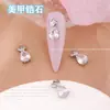 Popular en línea popular joyería para uñas chapada en oro circonita gota de agua joyería para uñas de alta gama exquisita estrella Luna diamante para uñas al por mayor