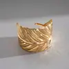 Pulsera Abierta de Metal Estilo Europeo y Americano con Patrón Redondo e Hilo Retorcido Pulsera Personalizada Transfronteriza Joyería de Moda de Gama Alta para Mujeres