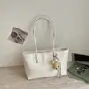 Bolsa de mão para o dia a dia 2026 verão nova cor sólida ins bolsa casual bolsa de ombro única bolsa de axila versão coreana bolsa tote
