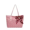 Bolsa de mano tipo tote al por mayor, estilo chino, para mujer, colores nuevos primavera 2026, con bloques de color, lazo, bandolera, versátil, para el antebrazo