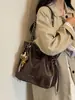Bolsos transfronterizos de moda 2026 nuevos bolsos de hombro con cadena otoño/invierno bolsos cruzados tipo cubo de moda nicho