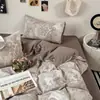 Juego de ropa de cama de cuatro piezas de gasa de doble capa para madre e hijo de grado A, con un patrón floral retro, que incluye una funda de edredón, una sábana bajera y un juego de sábanas de tres piezas para dormitorios