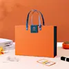 Venta al por mayor de cajas de regalo tipo flip-top listas para enviar, cajas de regalo de cumpleaños portátiles de alta gama, cajas vacías, cajas de regalo para recuerdos y cajas de regalo personalizadas