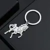 Moda Europea y Americana Estilo Neutro Exquisito Acero Inoxidable de Alta Calidad Forma de Elemento Animal Accesorios Colgantes para Llavero de Hombres y Mujeres