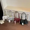 Bolso de hombro casual vintage de gran capacidad para mujer, para ir al trabajo, nuevo modelo de verano 2026, alto valor estético, diseño simple