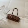 Bolso de axila de nicho estilo coreano Shuai Mi Jia para mujer, nuevo modelo de moda otoño 2026, bandolera baguette simple para el día a día