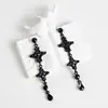 Brincos Amazon cross-border, grandes, galvanizados, elegantes, estilo longo, com um toque de luxo, apresentando franjas e adornos de strass preto.