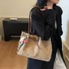Bolsa de Camurça Feminina Grande Capacidade 2025 Nova Outono e Inverno Versátil Fosca Retrô Bolsa de Ombro Bolsa Tote para o Dia a Dia