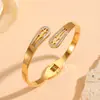 Versátil Transfronterizo Acero Inoxidable Electrochapado al Vacío Joyería Flor Pequeña Patrón de Ojo Varios Brazaletes para Mujer Brazaletes de Diamante