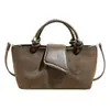 Bolso de Mano Retro de Gamuza para Mujer 2026 Nuevo Bolso Boston de Gama Alta Versátil para Viajes Diarios Bolso Pequeño de Hombro Cruzado