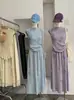 Conjunto de Dos Piezas Omalai: Chaleco de Punto sin Mangas con Flores Tridimensionales y Falda Larga Nueva Colección Primavera/Verano 7007