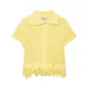 Aliexpress Wholesale Otoño 2025 Nuevo Traje de Chaqueta de Punto a Cuadros con Decoración de Borlas + Falda para Mujer Transfronterizo Europeo y Americano
