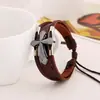 Pulsera unisex al por mayor de joyería de Yiwu estilo europeo y americano pulsera de cruz de cuero genuino pulsera de piel de vaca