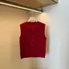 2026 Verano de un solo botón con cuello en V de temperamento adelgazante tejido sin mangas camisa de color liso simple