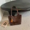 Bolsa de trabalho elegante e espaçosa para mulheres, novo design 2026, adequada para a escola, uma bolsa de mão ou sacola de ombro da moda