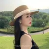 Chapéu de Palha com Topo Plano Feminino Fedora de Palha Tecida Francês 2026 Novo Chapéu de Sol de Aba Larga para Verão Chapéu de Sol para Férias na Praia