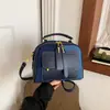 Bolso de mano bandolera de tendencia transfronteriza para mujer 2026 nuevo bolso caja de bloques de color bolso cruzado retro de mezclilla de nicho