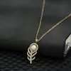 2026 Nuevo Collar Retro Francés Barroco de Perlas de Agua Dulce para Mujer Cadena de Clavícula de Plumas de Gama Alta Gargantilla Exquisita