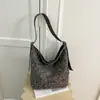 Bolsa de nylon com estampa de leopardo retrô de nicho para mulheres, novo modelo 2026, grande capacidade, moderna e versátil, adequada para o trabalho, pode ser usada como bolsa de ombro ou transversal.