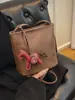 Bolso de Cubo Retro de Cuero Suave Transfronterizo para Mujer Nuevo Estilo 2026 Bolso de Hombro Elegante con un Toque de Alta Gama para Viajes Diarios y Uso Cruzado
