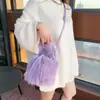 2023 nuevo estilo bolso cubo portátil de pelo sintético de zorro correa peluda bolso bandolera color macarrón dulce simple
