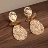Pendientes Metálicos Exagerados de Forma Irregular de Gota de Agua Europeos y Americanos para Mujer Pendiente de Flor de Ola de Industria Pesada de Nicho Accesorio de Concha de Pulpo Venta al por Mayor