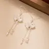 Pendientes Antiguos de Loto Sentido de Alta Gama Explosiones Dos Colgantes Shihuan Pendientes Chinos Nuevos Pendientes con Gancho para Oreja de Mujer Cheongsam Hanfu