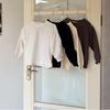 Ropa para niños estilo coreano de huevo puntiagudo 2024 primavera nueva para niños y niñas camiseta de cuello redondo sudadera de un solo color top versátil