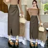Falda asimétrica para otoño e invierno, diseño sexy, falda de cuero plisada, ajustada a la cadera, de cintura alta, falda midi plisada