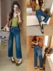 Otoño TOP Estilo Europeo Guangzhou Trece Líneas estilo dinero viejo Jeans de pierna recta con estiramiento perfecto de 360 grados con cinturón 61861