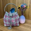 Bolso cubeta de diseño nicho con diamantes para mujer 2023 nueva moda bolso completo de diamantes dios del vino bolso de hombro cruzado para axila moda