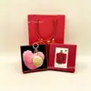 Día de San Valentín Chino Colgante Llavero Oro Rosa con Certificado Set Bolsa Encanto Regalo de Negocios Mayoreo