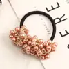 AliExpress Amazon popular corda de cabelo de pérola com contas feita à mão moda feminina elástico anel de cabelo adorno de cabeça flor atacado