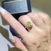 Anillo de moissanita diamante ovalado amarillo al por mayor forma especial europeo y americano anillo huevo de paloma diamante de color anillo de propuesta nuevo mujer