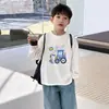 Camiseta Transpirable de Algodón Puro con Estampado de Dibujos Animados para Niños 2026 Nueva Elegante Ropa de Otoño Infantil Camiseta de Manga Larga para Niños Capa Base