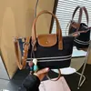 Bolso Exquisito de Gran Capacidad Transfronterizo para Mujer 2026 Nuevo Verano Bolso de Hombro y Axila de Gran Capacidad Bolso Cruzado Tipo Cubo para Viajes