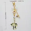 Bolsa de Lazo Dorado Llavero con Colgante de Lazo Bordado con Perlas Accesorios para Cartera Llavero Lindo