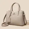 Bolso de mano pequeño cuadrado para mujer 2026, nuevo, minimalista y elegante, de cuero suave, moderno y versátil, bolso cruzado con estilo