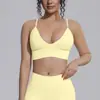 Nuevo top de yoga estilo europeo y americano, ropa interior deportiva de color liso con copas en el pecho, tirantes finos, hermoso diseño en la espalda, camiseta sin mangas de fitness, camisola de yoga