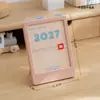 Novo Calendário Mini Temático de Humor 2027 Calendário de Mesa Criativo Suporte para Mesa Ornamentos Estilo Ins Calendário de Parede para Check-In