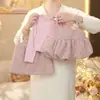 Conjunto de Primavera para Niñas 2026 Nuevo Elegante Camiseta Básica Falda de Tirantes Floral Dulce Conjunto de Tres Piezas de Primavera Moderno